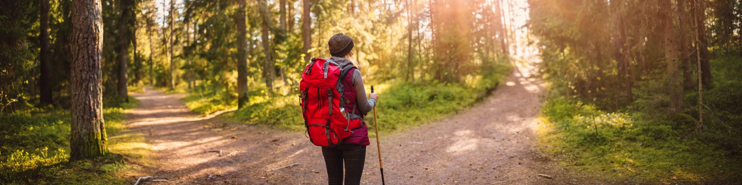 Woman hiking and going camping in nature